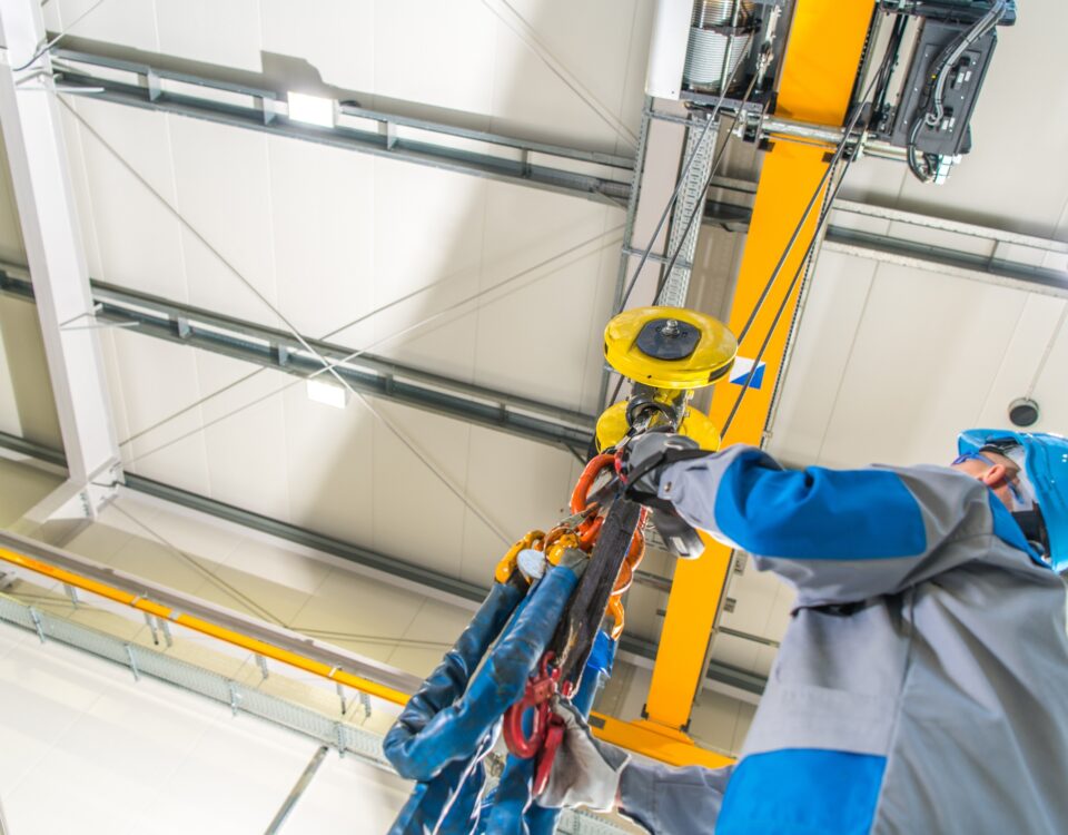 An employee using an OHG following Overhead Gantry Training