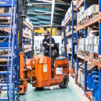 Pivot Steer Forklift Truck Pivot Steer Forklift Truck stacking goods in a warehouse