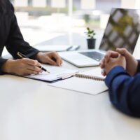 HR consultant helping an employee in a company