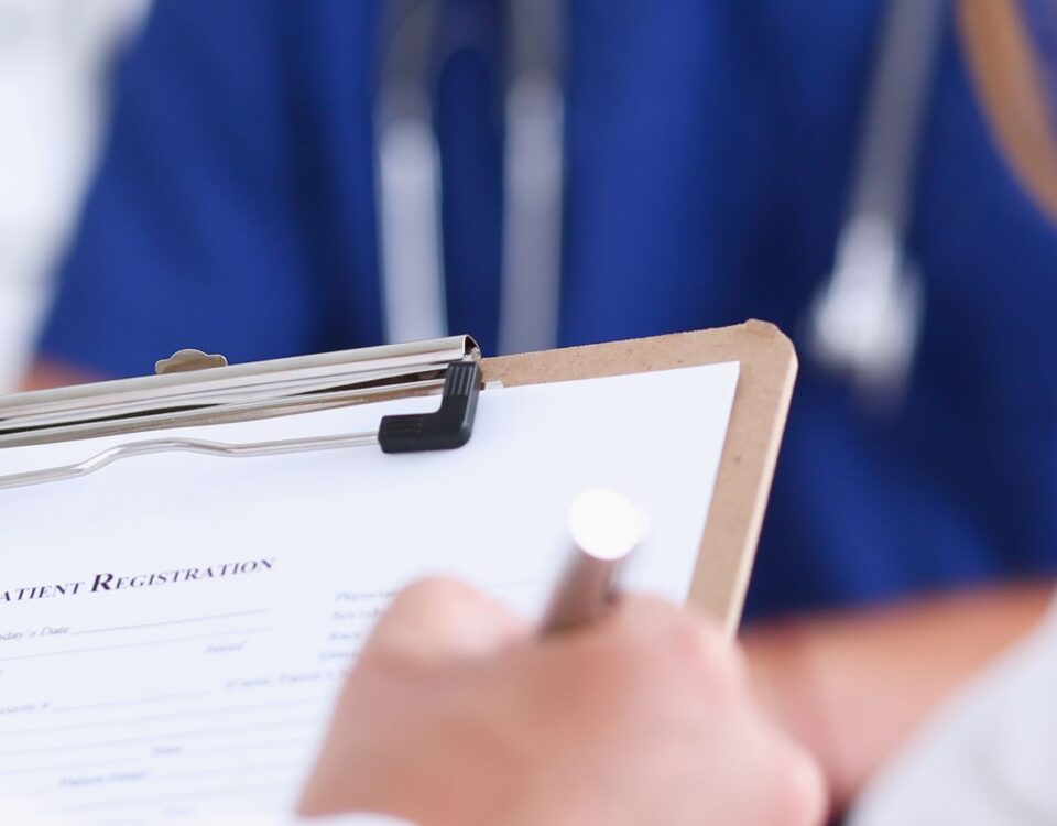 An employee receiving lung function testing