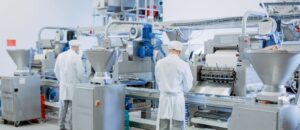 Employees working in a Food factory following SPA food and drink training