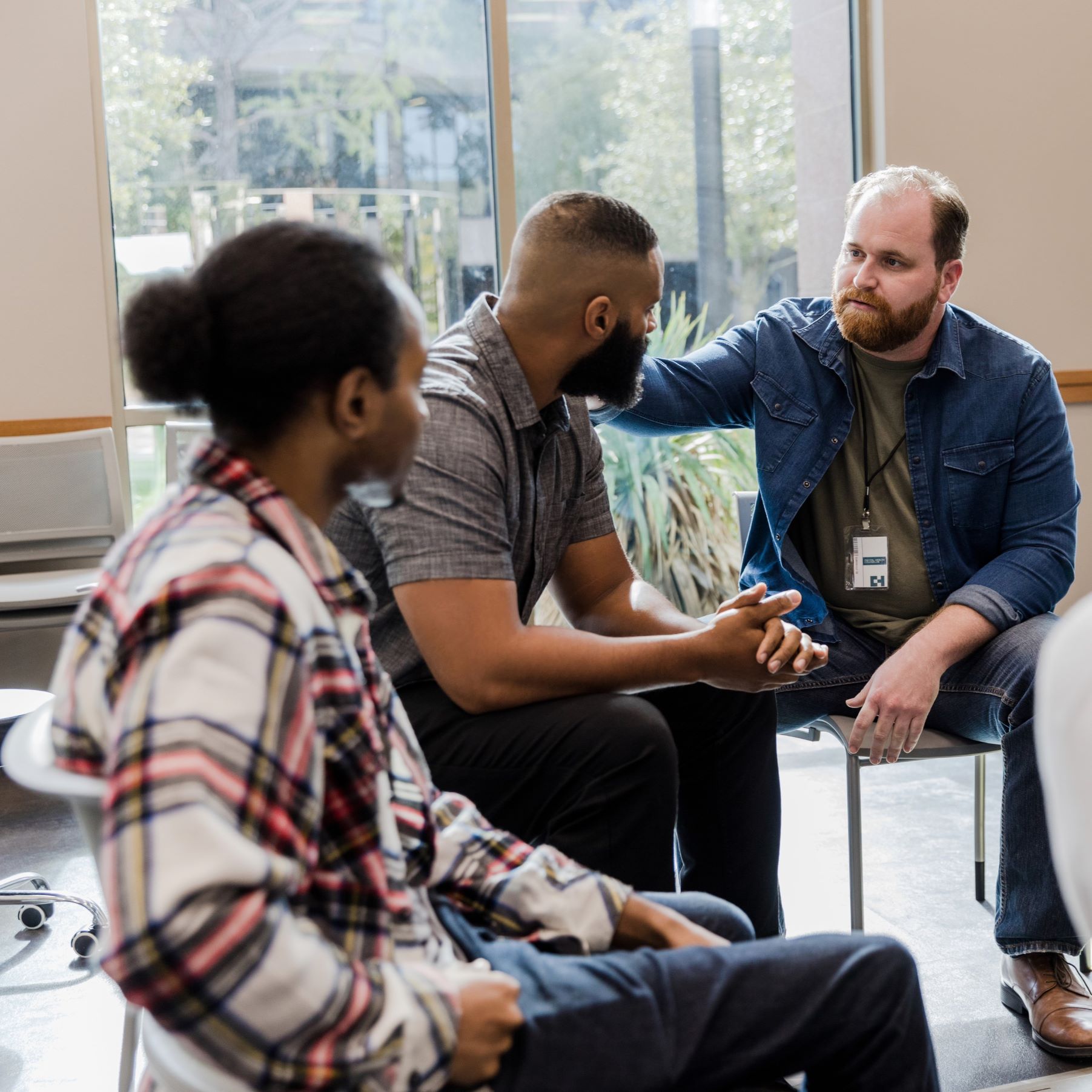 Men in a Mental Health circle held in the workplace for employees.