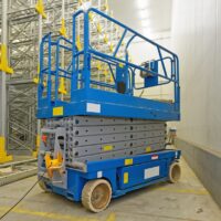 Scissor Lift Training Scissor lift in a warehouse used for training